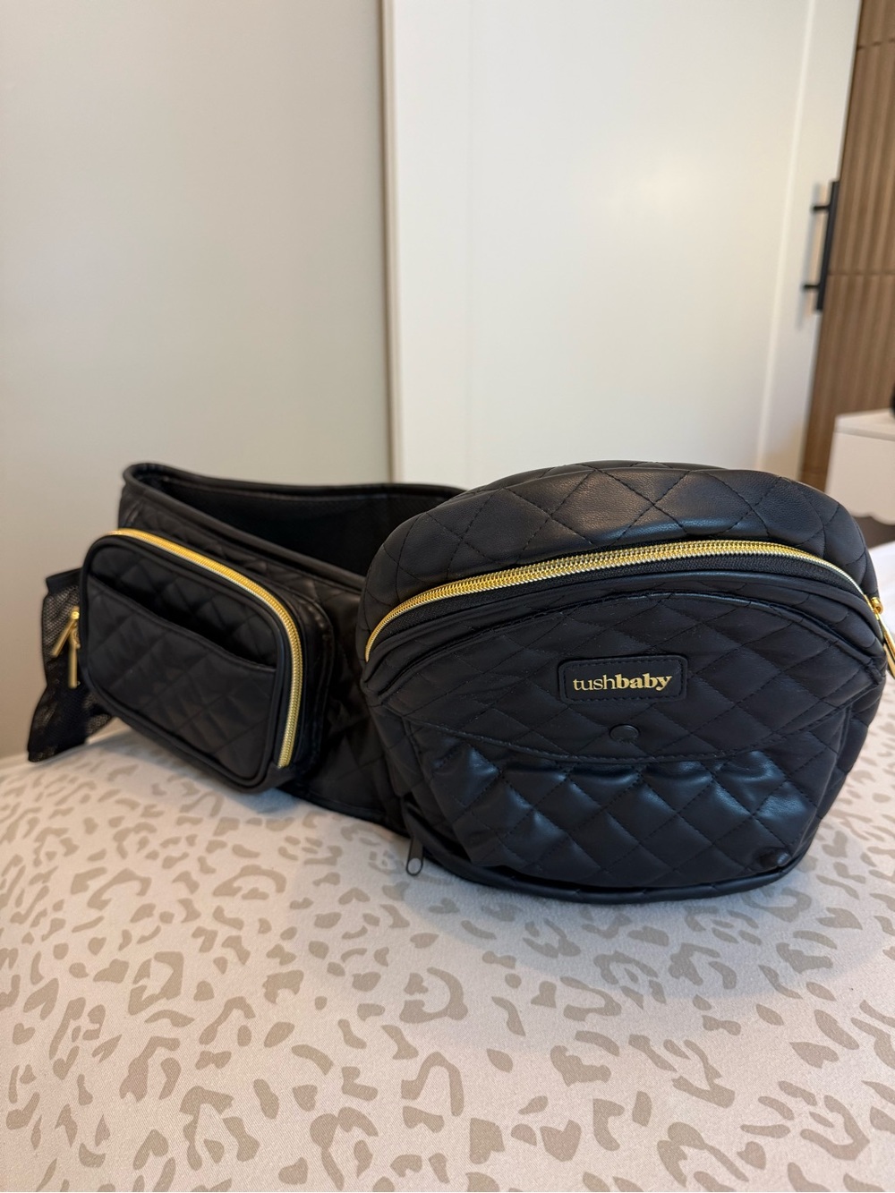 Tushbaby Quilted Black Baby Waist Bag with Gold Zippers with Extender